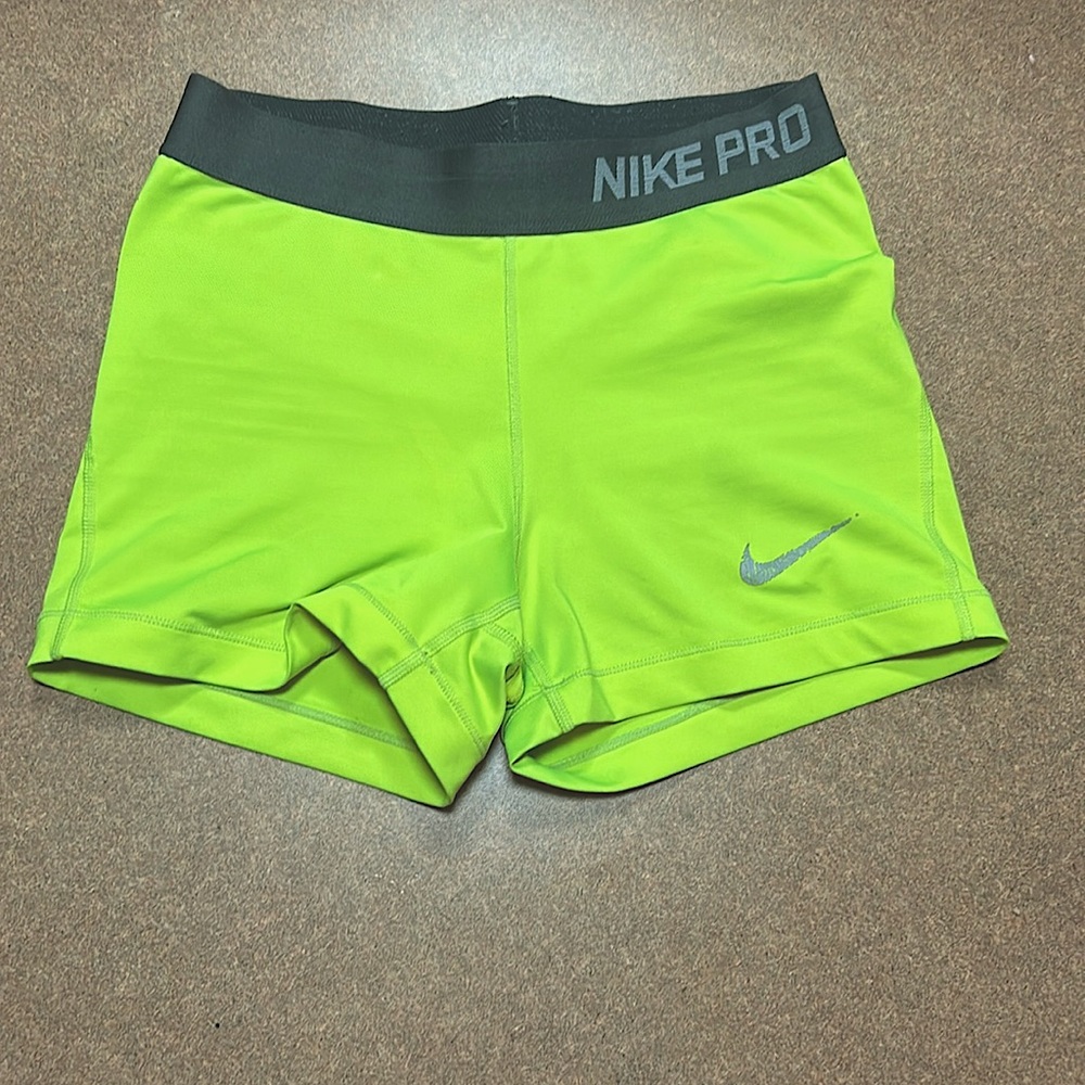 Neon green size small nike pros